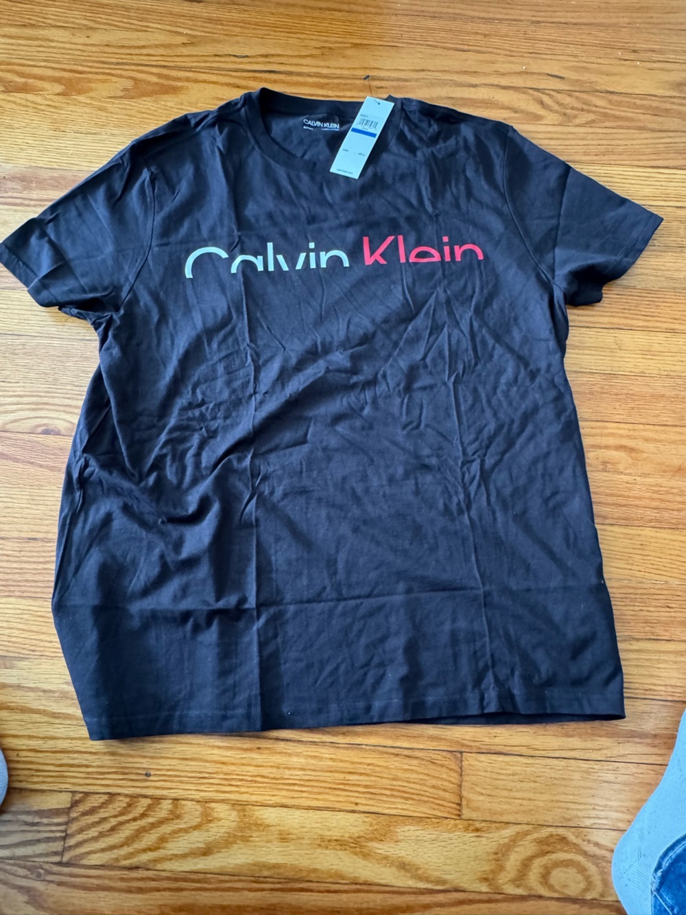 Calvin Klein Black Tee with with  and Red Logo New